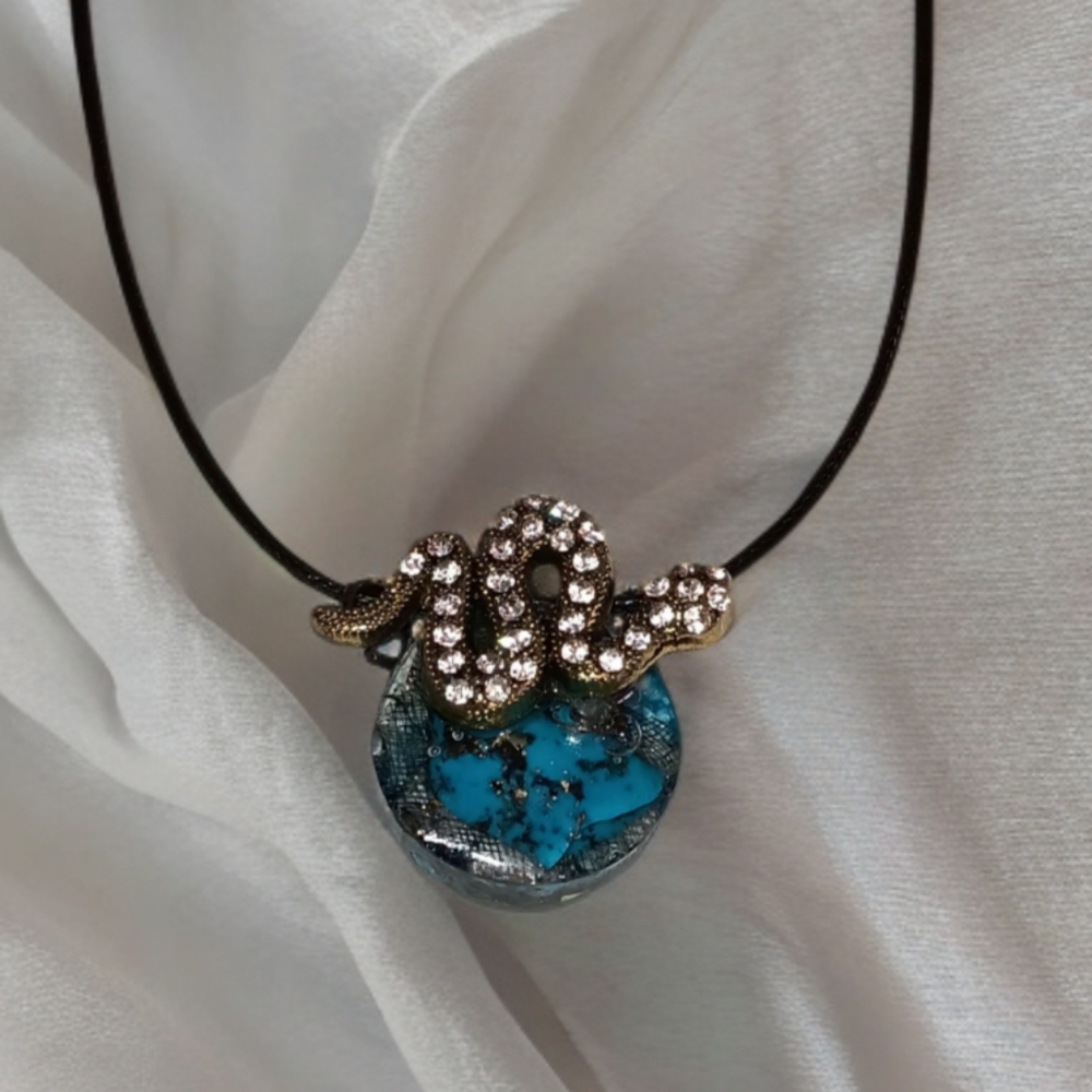 Elegant Blue and Gold Snake Pendant Necklace